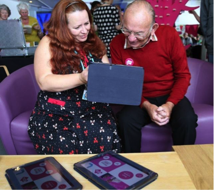 Visitor enjoys a demonstration of the My House of Memories app © Gareth Jones